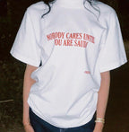 nobody cares until you're saudi white tee
