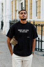 nobody cares until you're saudi black tee